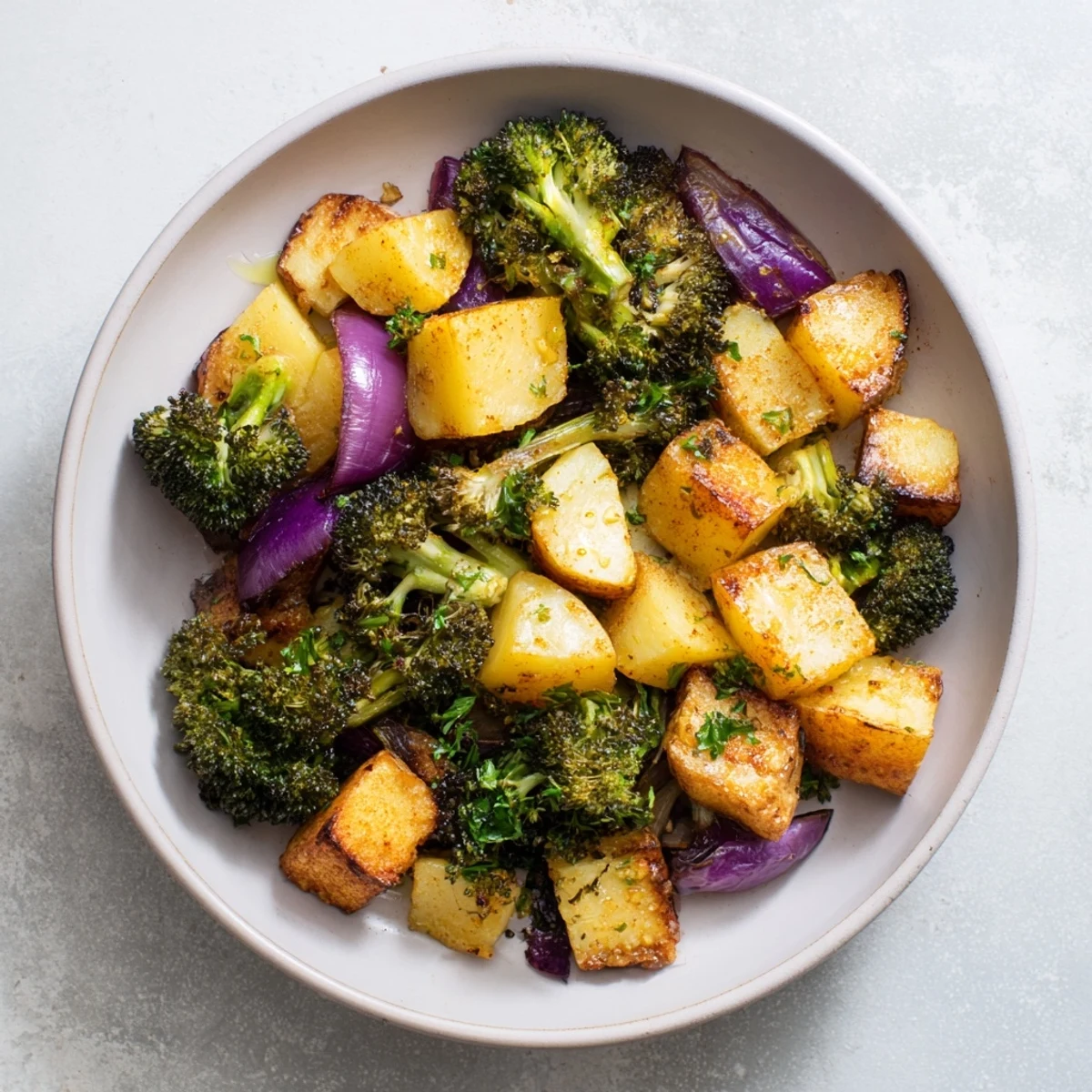 Tender broccoli and perfectly roasted Roasted Lemon Potatoes, seasoned with smoky paprika; delicious!