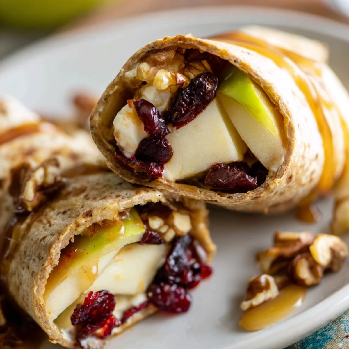 Inviting platter featuring freshly made Cranberry Goat Cheese & Walnut Holiday Wraps showcasing the textures and flavors.