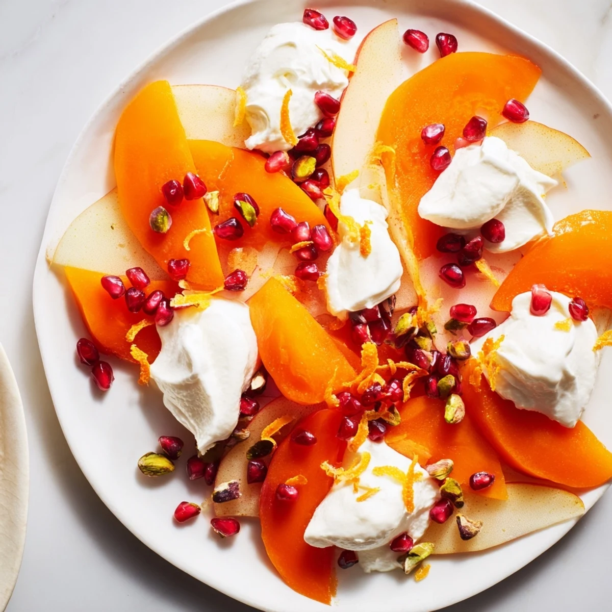 A gorgeous Winter Fruit Snowscape of persimmons, pears, and snowy mascarpone, ready to enjoy.