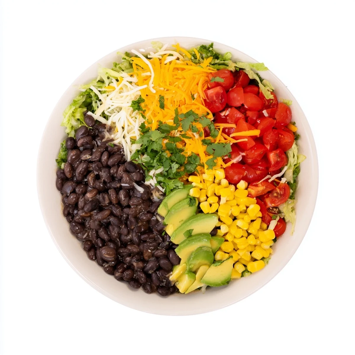 Southwest Sunset Palette salad layered with vibrant peppers, cheese, and black beans, perfect for a Tex-Mex dinner.