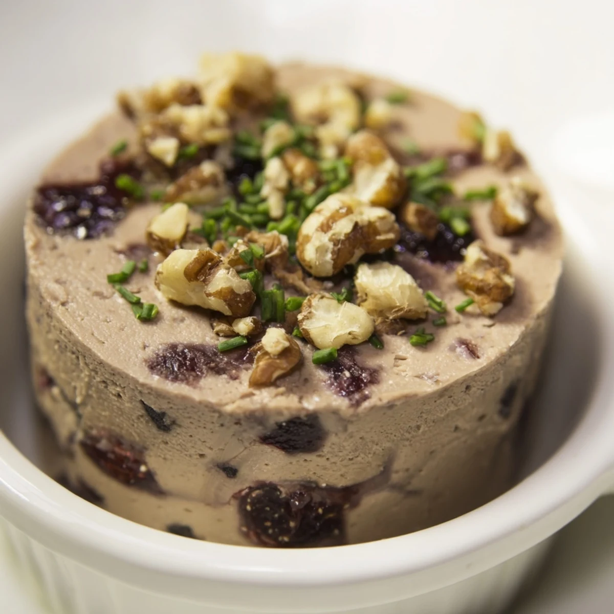 Indulge in our The Velvet Underground appetizer, featuring rich pâté and crunchy, hidden nuts with jam swirls.