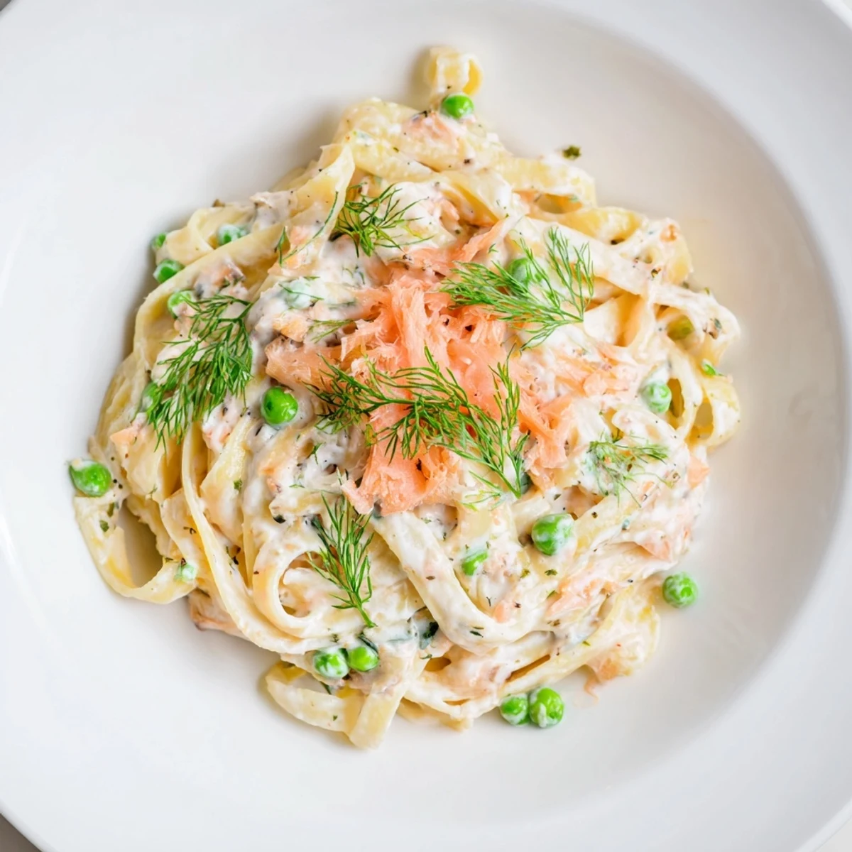A creamy dill pasta dish, rich and flavorful, with fresh dill topping.