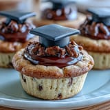 Celebrate your graduate with these sugar cookies topped by fondant mortarboard hats and yellow tassels.