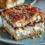 Melt-in-your-mouth Easy Cinco de Mayo Sopapilla Cheesecake Bars baked golden brown, perfect for sharing.