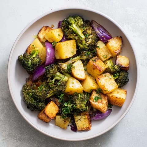 Tender broccoli and perfectly roasted Roasted Lemon Potatoes, seasoned with smoky paprika; delicious!