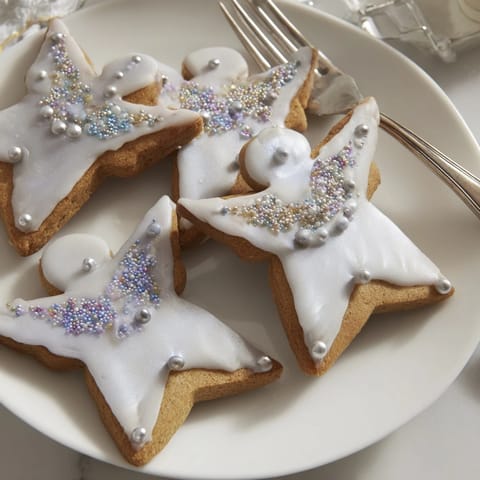 Freshly baked Biscuits Anges de Noël, ready to eat, are light, buttery, and perfect Christmas treats.