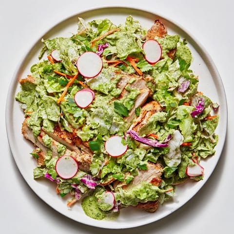 Creamy Green Goddess Cabbage Slaw with juicy chicken, perfect for a light yet satisfying dinner.